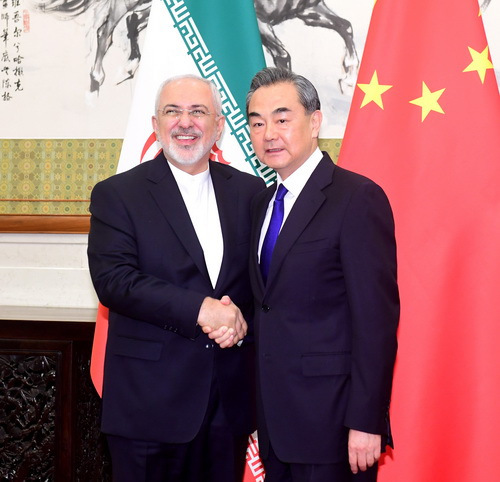 2018年5月13日，国务委员兼外交部长王毅在北京与伊朗外长扎里夫举行会谈